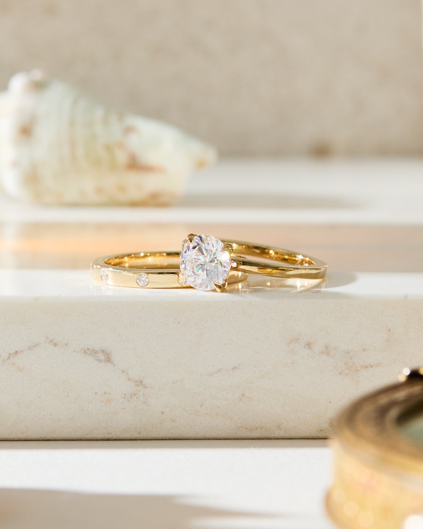 Diamond solitaire wedding ring with gold and diamond wedding band, handmade in Nashville