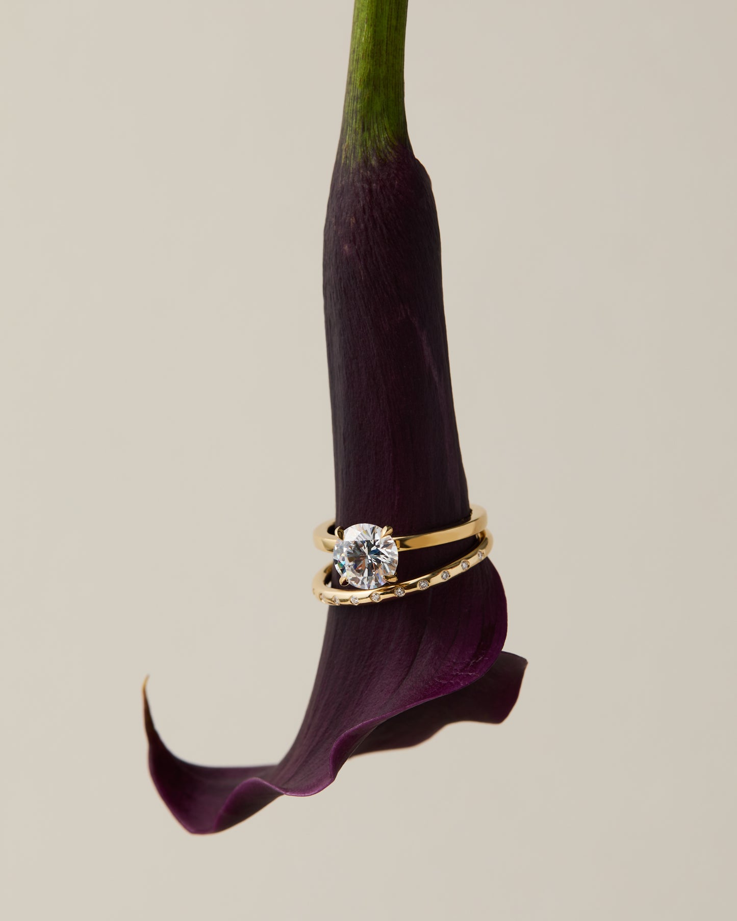 Gold solitaire wedding ring with sleek diamond band, handmade in Nashville