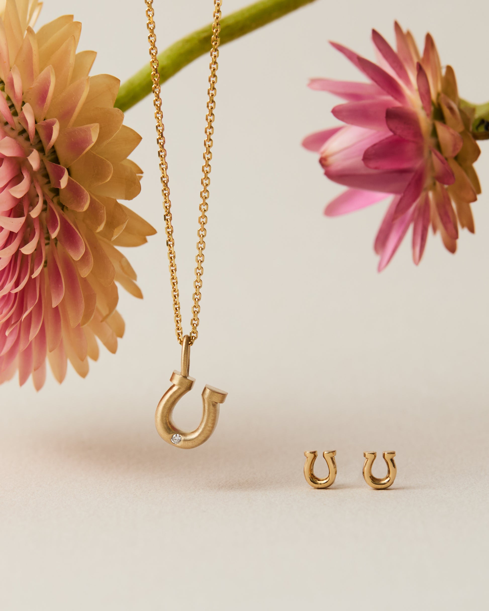 Gold horseshoe stud earrings, made in Nashville, TN
