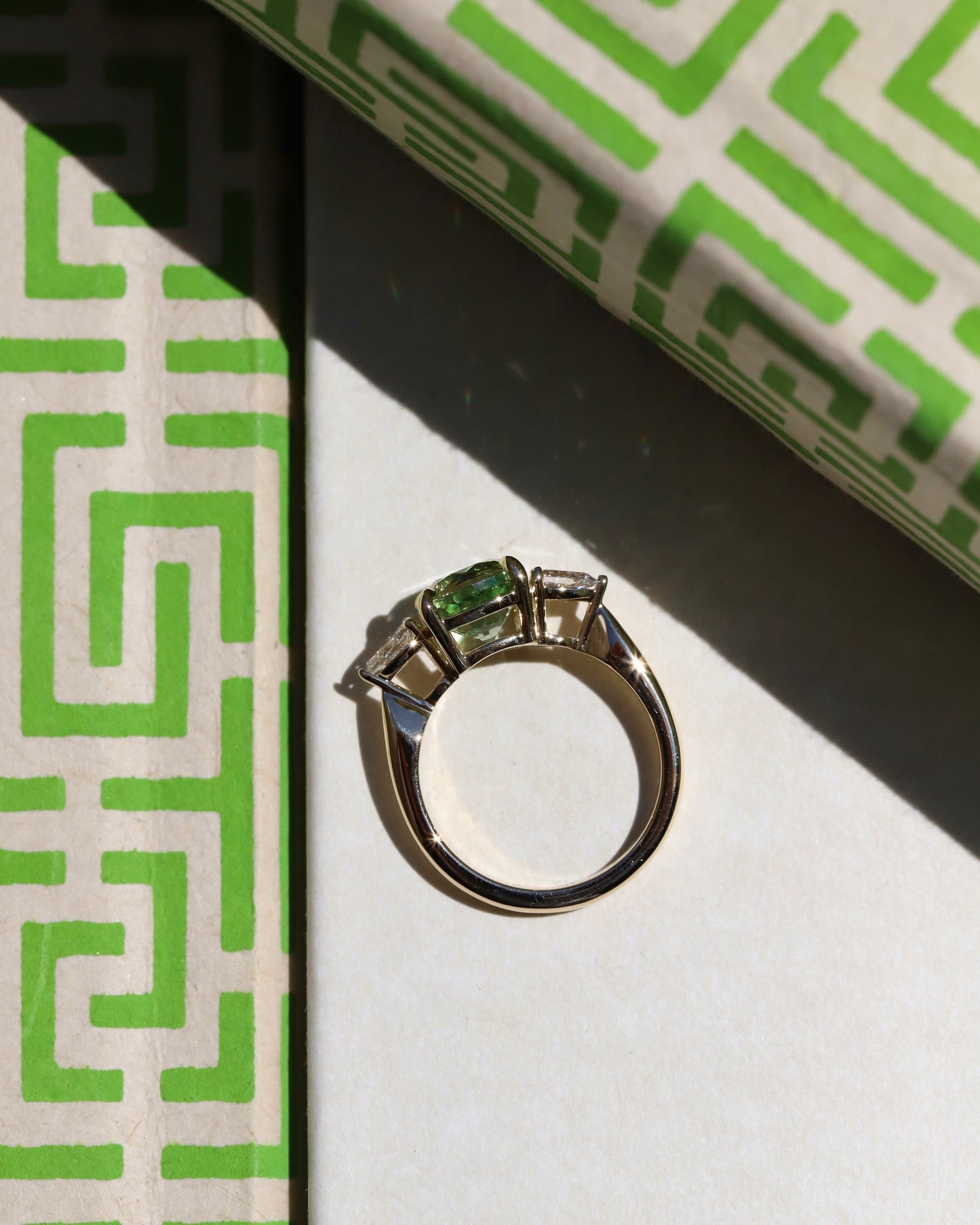 Merelani mint green garnet and diamond three stone ring in yellow gold made in Nashville, Tennessee
