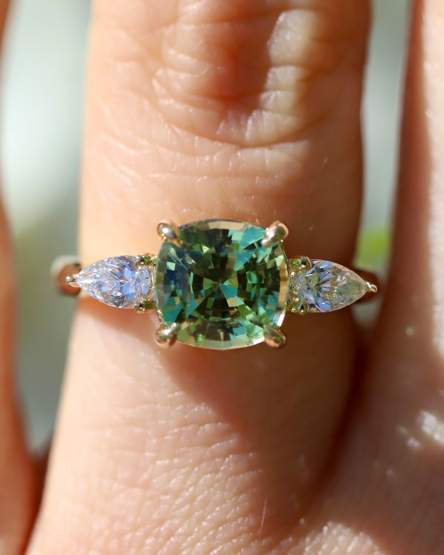 Merelani mint green garnet and diamond three stone ring in yellow gold made in Nashville, Tennessee