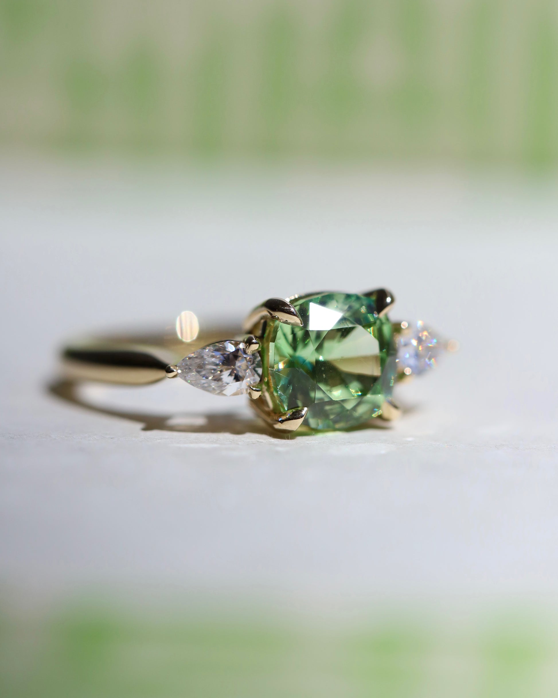 Merelani mint garnet and diamond three stone ring in 14k gold made in Nashville, Tennessee