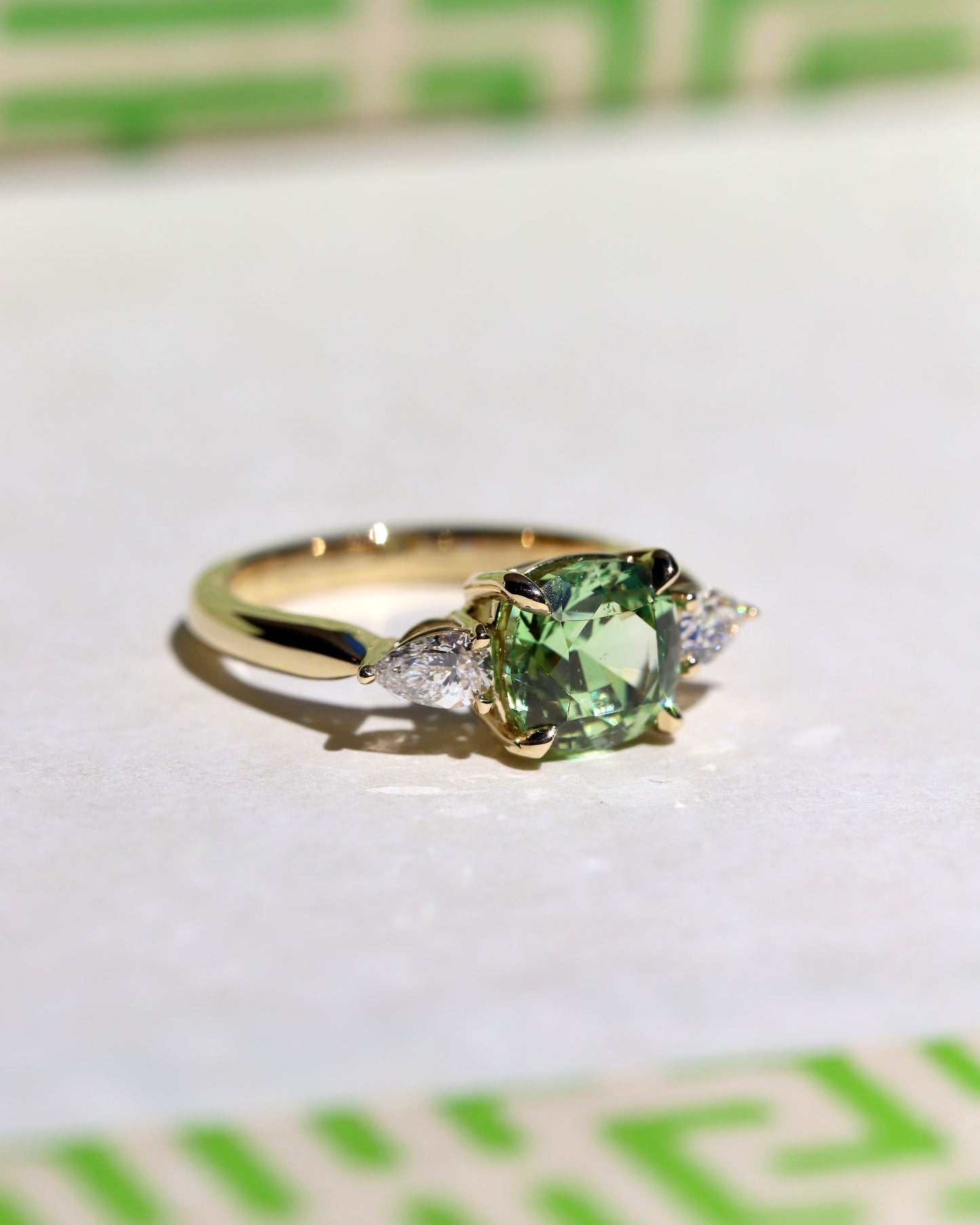 Merelani mint garnet and diamond three stone ring in 14k gold made in Nashville, Tennessee