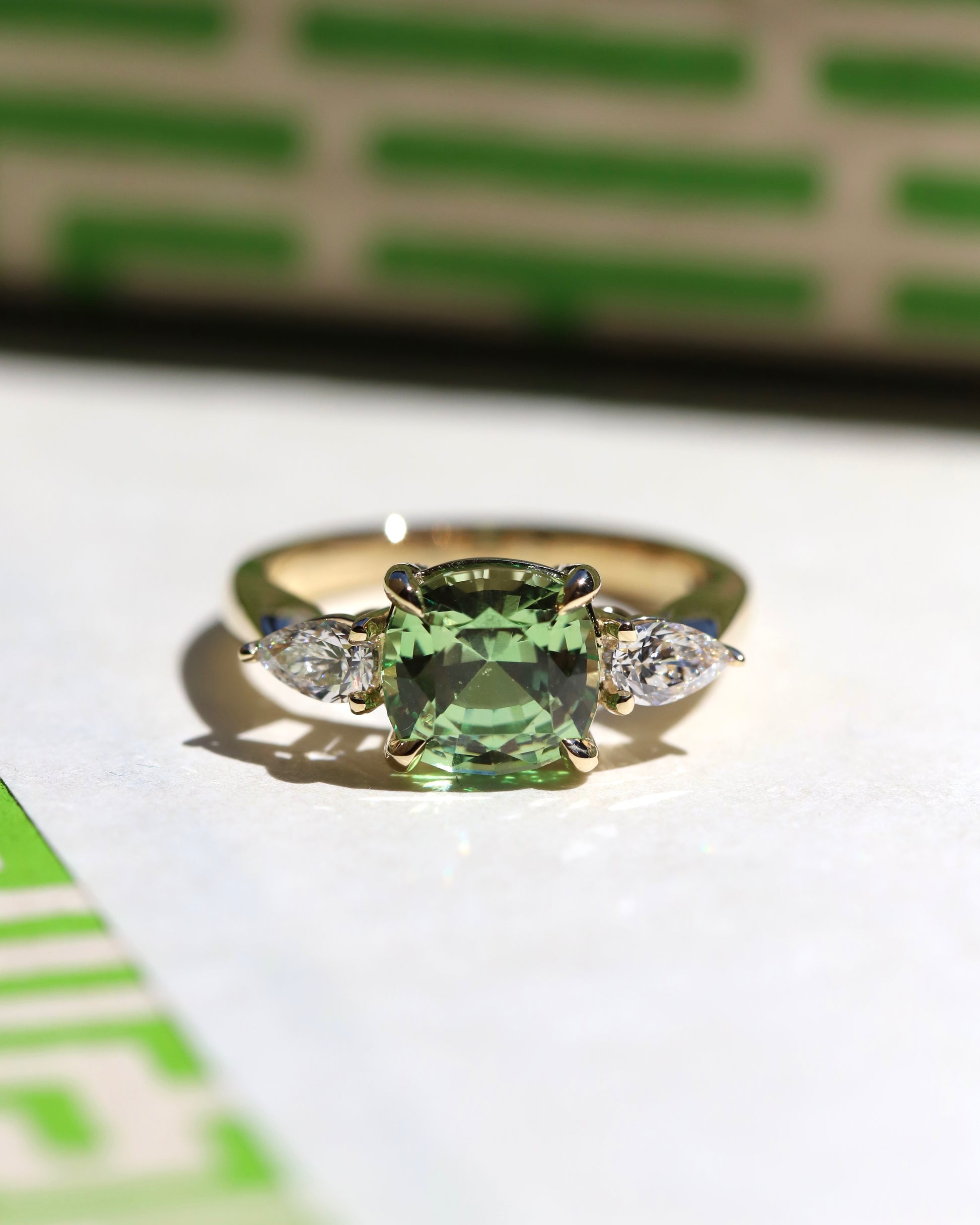 Merelani mint garnet and diamond three stone ring in 14k gold made in Nashville, Tennessee