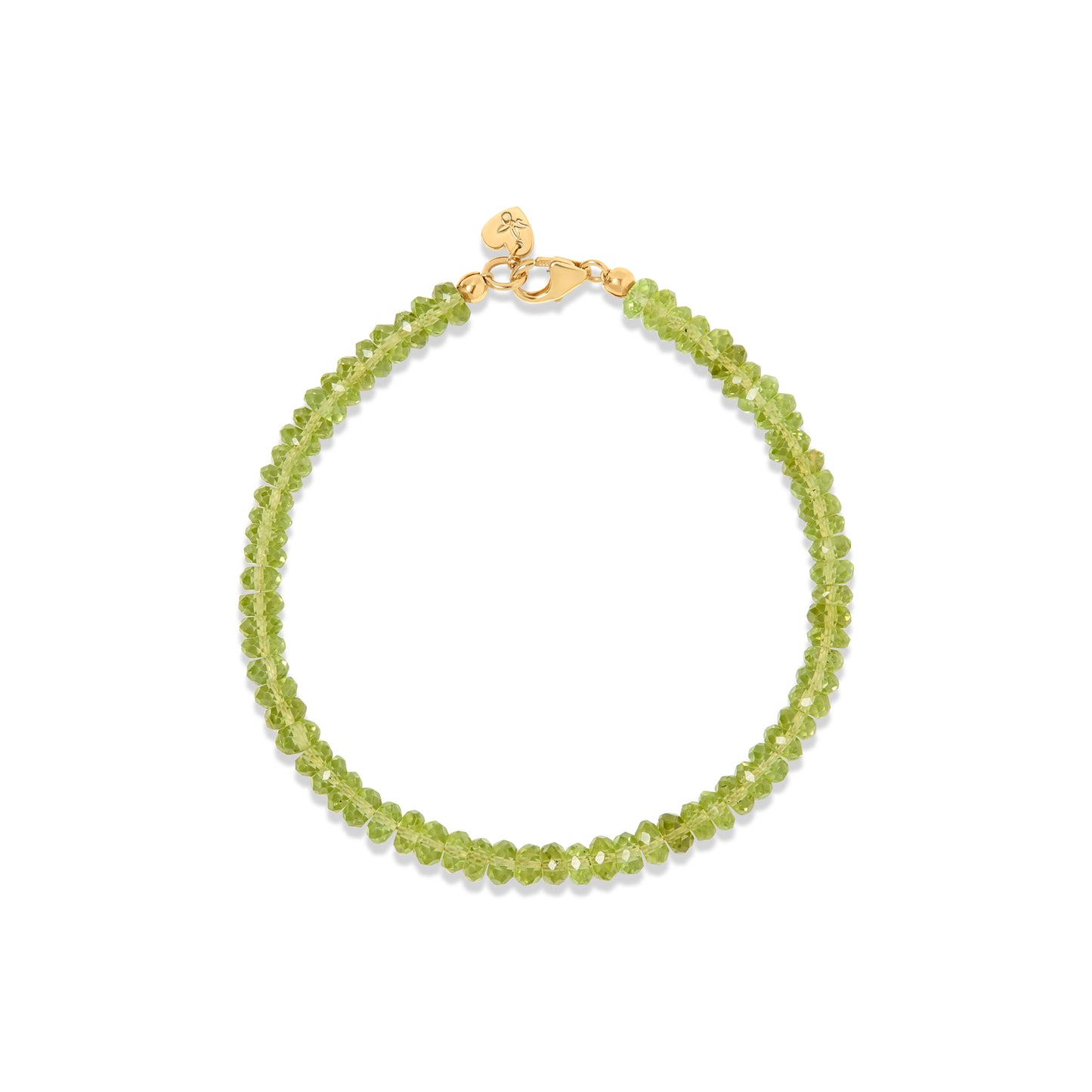 Peridot gemstone beaded bracelet with gold clasp styled in Nashville, Tennessee