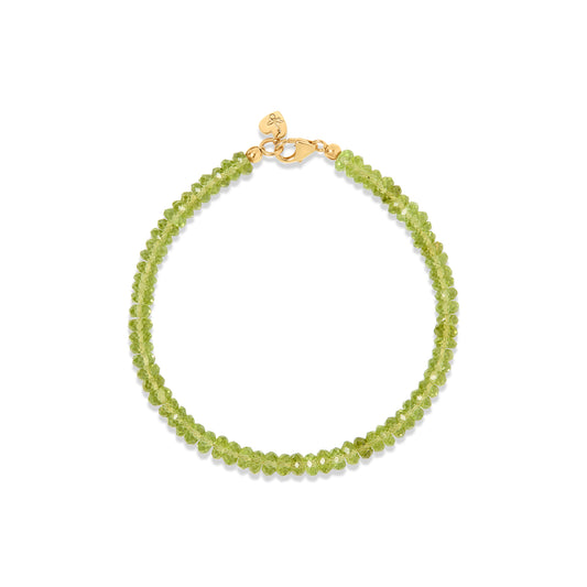 Peridot gemstone beaded bracelet with gold clasp styled in Nashville, Tennessee